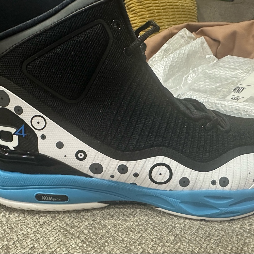 Black and White High-Top Sneakers with Blue Soles